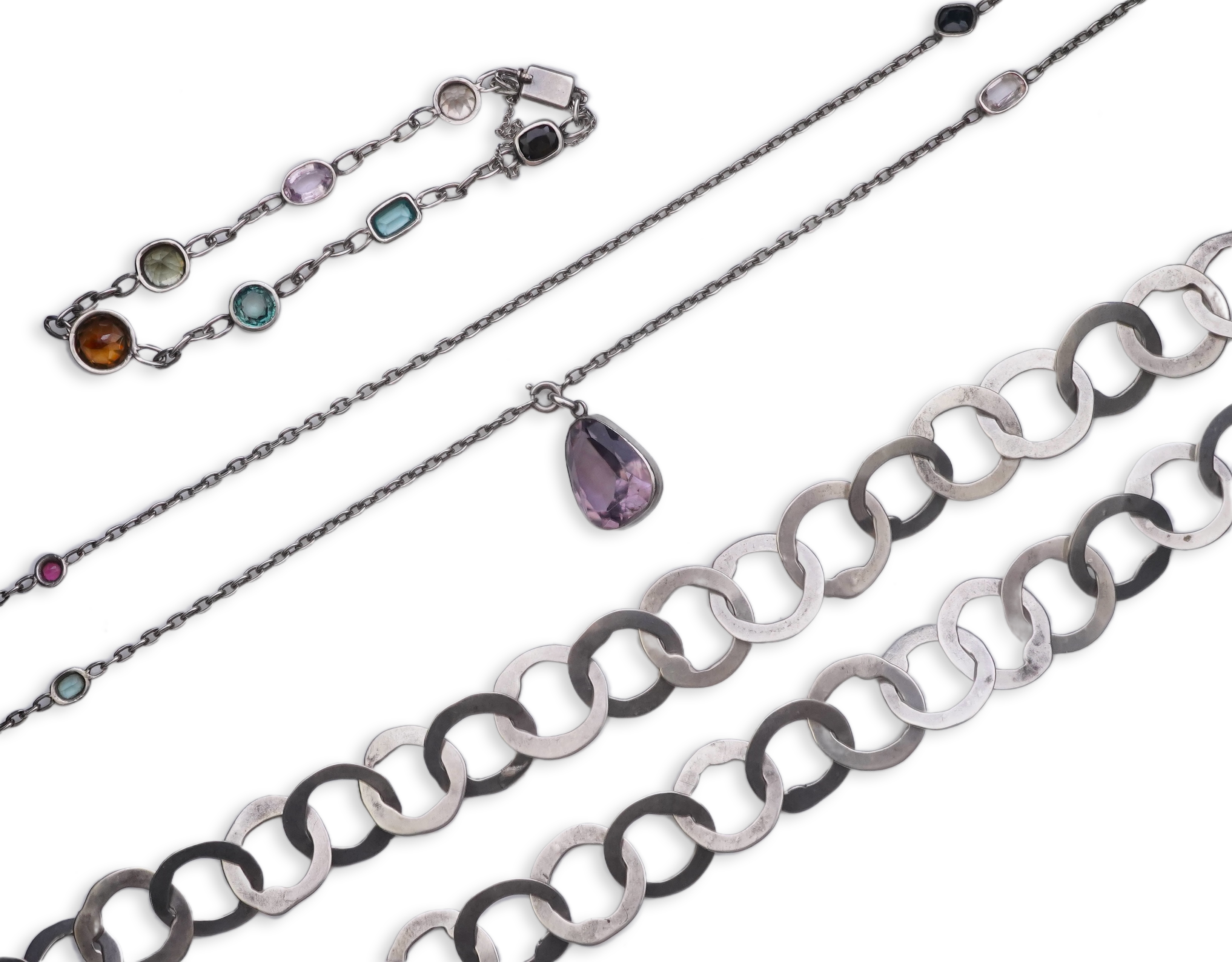 A collection of silver and gem-set jewellery